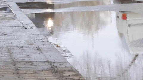 Car rain big puddle of water spray from the wheels Stock Footage 88714145
