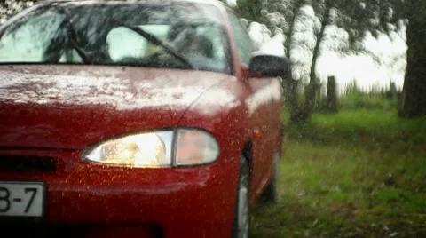 Car in the rain Stock Footage 8599355