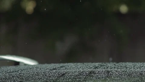 Car in rain with water drops Stock Footage 77583339