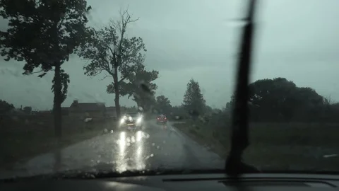 From the car in the rain in the windshield dripping water Stock Footage 111698517