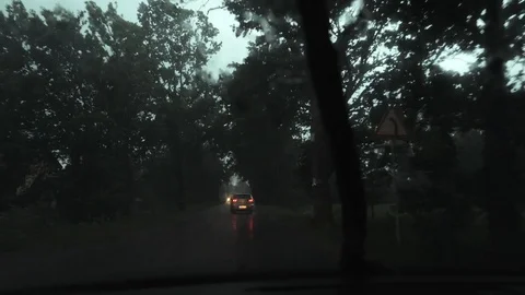 From the car in the rain in the windshield dripping water Stock Footage 111698544