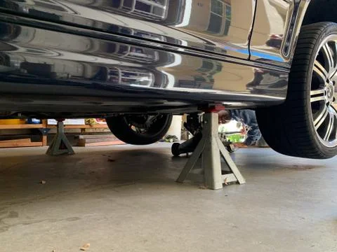 Car Raised up on Jacks Stock Photos