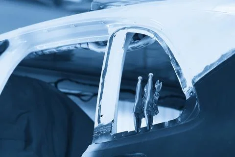 Car ready to be fixed in auto repair shop Stock Photos