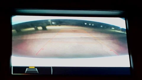 Car Rear View Camera While Vehicle Reversing at Night Stock Footage 106672452