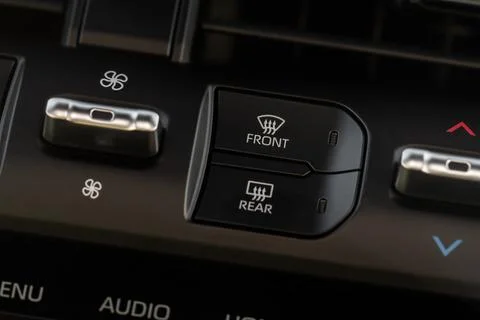 Car rear window heating button. Button of heating mirrors and rear window of  Foto stock