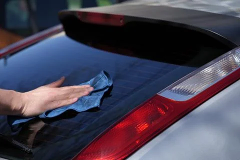 Car rear window wash soft fabric close-up Stock Photos