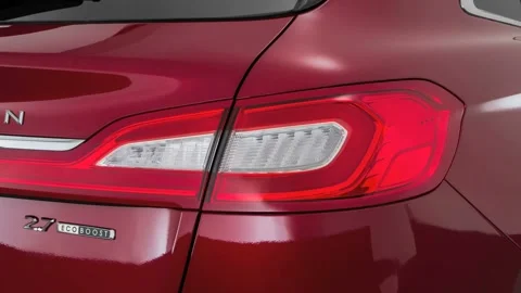 Car red tail light close up Ruby 2016 Lincoln MKX Reserve Stock Footage 159853937
