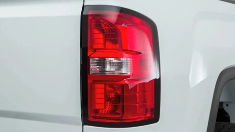 Car red tail light close up Summit White 2016 GMC Sierra 1500 Stock Footage 159870919