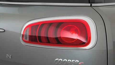 Car red tail light close up Melting Silver Metallic 2016 Mini Clubman Cooper S Stock Footage 159878856