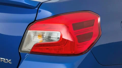 Car red tail light close up WR Blue Pearl 2017 Subaru WRX Premium Stock Footage 159882780