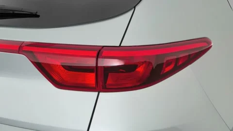 Car red tail light close up Sparkling Silver 2017 Kia Sportage LX Stock Footage 159888377