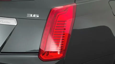 Car red tail light close up Phantom Gray Metallic 2017 Cadillac CTS Luxury Stock Footage 159909723