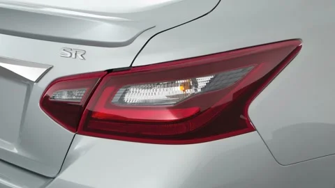 Car red tail light close up Brilliant Silver 2017 Nissan Altima 2.5 SR Stock Footage 159915050