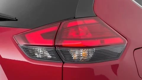 Car red tail light close up Palatial Ruby 2017 Nissan Rogue SL Hybrid Stock Footage 159932285