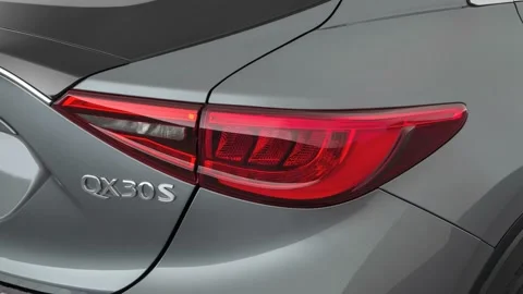 Car red tail light close up Graphite Shadow 2018 Infiniti QX30 Sport Stock Footage 159953000