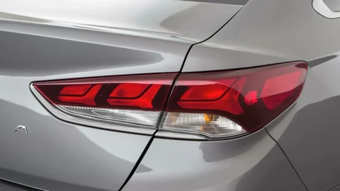 Car red tail light close up Machine Gray Metallic 2018 Hyundai Sonata SE Stock Footage 159955294