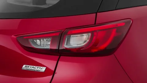 Car red tail light close up Soul Red Metallic 2018 Mazda CX-3 Grand Touring Stock-Footage 159965257