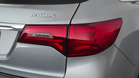 Car red tail light close up Lunar Silver Metallic 2018 Acura MDX SE Stock Footage 159976662