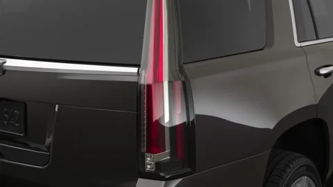 Car red tail light close up Dark Granite Metallic 2018 Cadillac Escalade Luxury Stock Footage 159980101