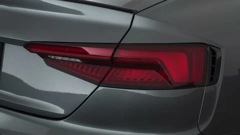 Car red tail light close up Daytona Gray Pearl Effect 2018 Audi RS 5 2.9 TFSI Vídeos de archivo 160005856