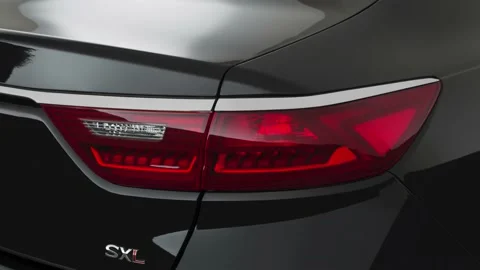 Car red tail light close up Aurora Black 2018 Kia Cadenza Limited Stock Footage 160008787