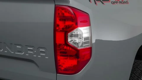 Car red tail light close up Cement 2018 Toyota Tundra SR5 Video stock 160014007