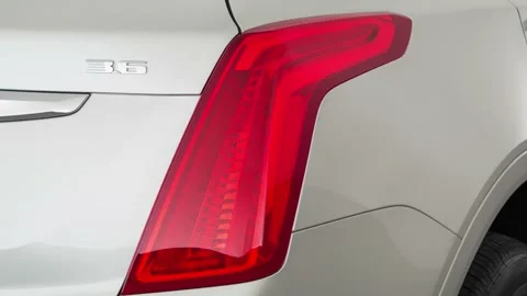 Car red tail light close up Radiant Silver Metallic 2019 Cadillac XT5 Luxury Stock Footage 160019158