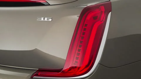 Car red tail light close up Bronze Dune Metallic 2019 Cadillac XTS Luxury Stock Footage 160021124