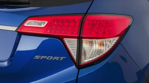 Car red tail light close up Aegean Blue Metallic 2019 Honda HR-V Sport Stock Footage 160029273