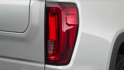 Car red tail light close up Quicksilver Metallic 2019 GMC Sierra 1500 SLT Stock Footage 160036767
