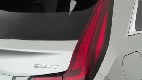 Car red tail light close up Radiant Silver Metallic 2019 Cadillac XT4 Luxury Stock Footage 160038054