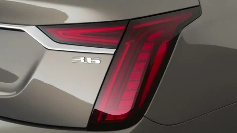 Car red tail light close up Bronze Dune Metallic 2019 Cadillac CT6 Luxury Stock Footage 160052932