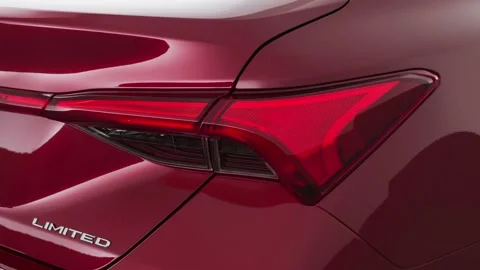 Car red tail light close up Ruby Flare Pearl 2019 Toyota Avalon Limited Stock Footage 160076119