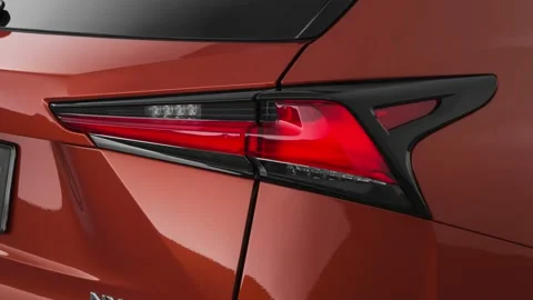Car red tail light close up Cadmium Orange 2020 Lexus NX Hybrid NX 300h Luxury Stock Footage 160085193