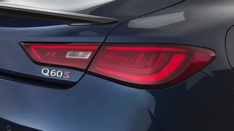 Car red tail light close up Solid Red 2020 Infiniti Q60 Red Sport 400 coupe Stock Footage 160102177