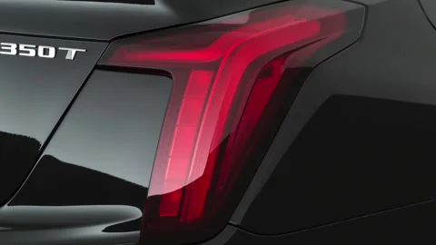 Car red tail light close up Silver Ice Metallic 2020 Cadillac CT5 Luxury sedan Stock Footage 160108833