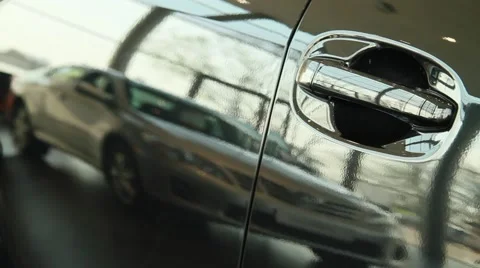 Car reflection in the door of another car Stock Footage 65090082