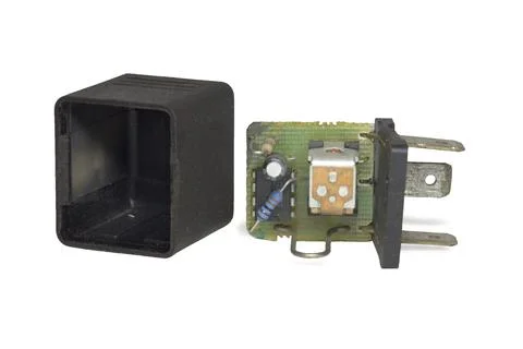 Car relay, disassembled, on/off electronic component, isolated on white bac.. Stock Photos