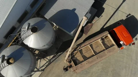 Car reloader with a trailer filled with grain, for transportation to the Stock Footage 133226949