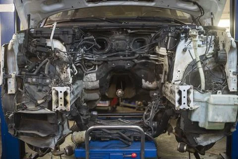 Car with removed broken engine 写真素材