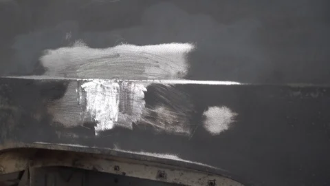The car is repaired with stud welding Stock Footage 117940413