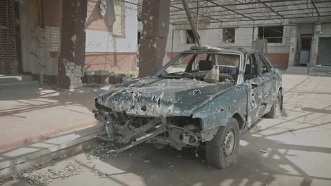 A car riddled with bullets and shrapnel from Russian shells Stock Footage 201245201