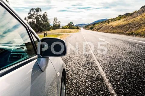 Car ride on road in sunny weather Stock Photos