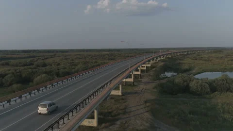 The car rides on a long bridge Stock Footage 90016963