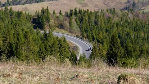 Car rides on a mountain road. Stock Footage 75389315