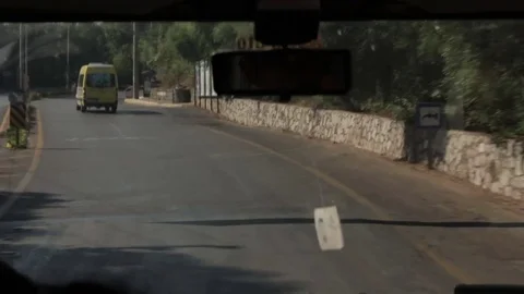 Car rides on a mountain road, view from the car Stock Footage 82317436