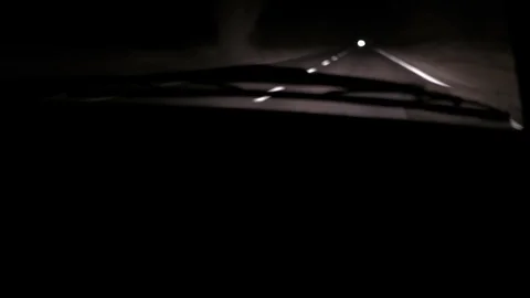Car rides on the night road. Inside view. Dashboard, radio, DVR. Overtaking. Видео 100844076