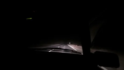 Car rides on the night road. Inside view. Dashboard, radio, DVR. Overtaking. Stock Footage 100844126