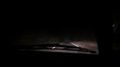 Car rides on the night road. Inside view. Dashboard, radio, DVR. Overtaking. Stock Footage 100844137