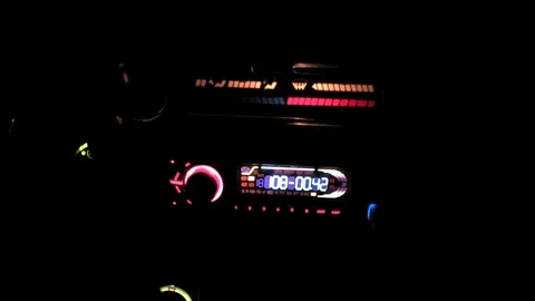 Car rides on the night road. Inside view. Dashboard, radio, DVR. Overtaking. Stock Footage 100844153
